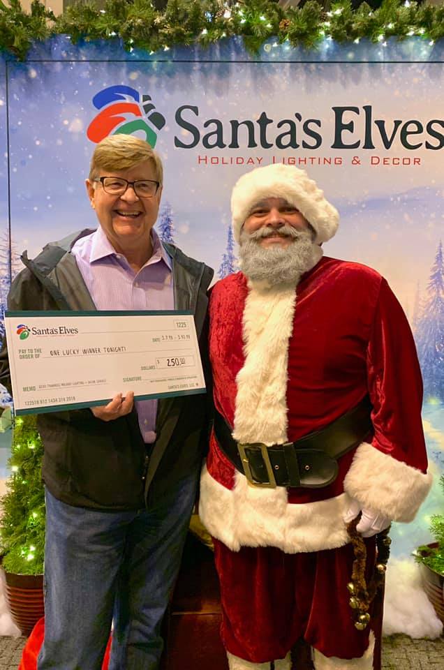 Santa with a Santa's Elves community member in St. Louis